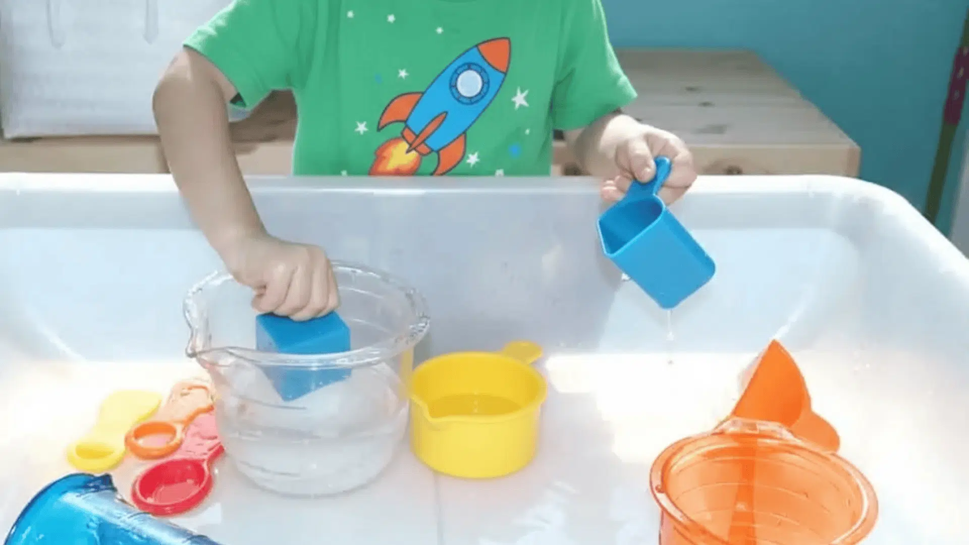 water play with measuring cups math activities for preschoolers